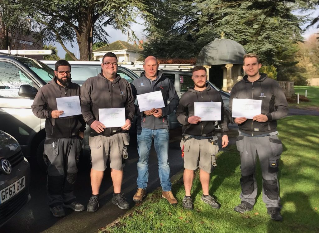 Five working at height course delegates holding their certificates
