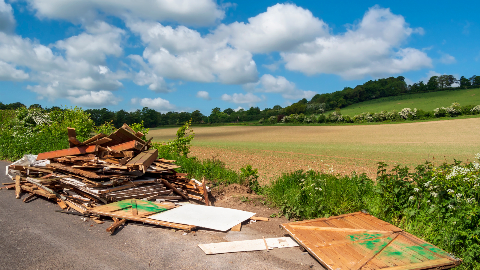 Fly-tipped waste in English countryside