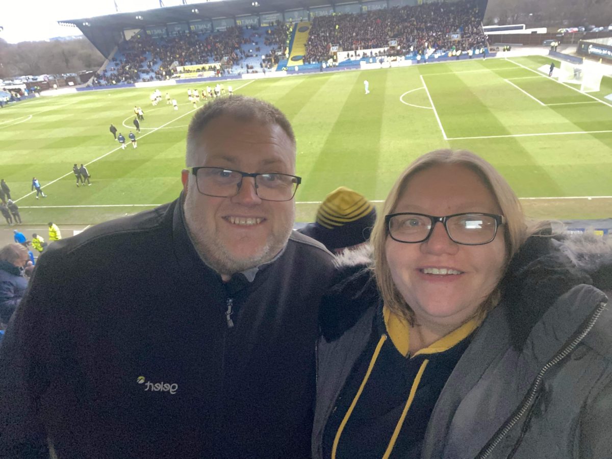 Clair and Aaron Smith watching the Oxford United V Bolton game at Kassam Stadium in February 2022