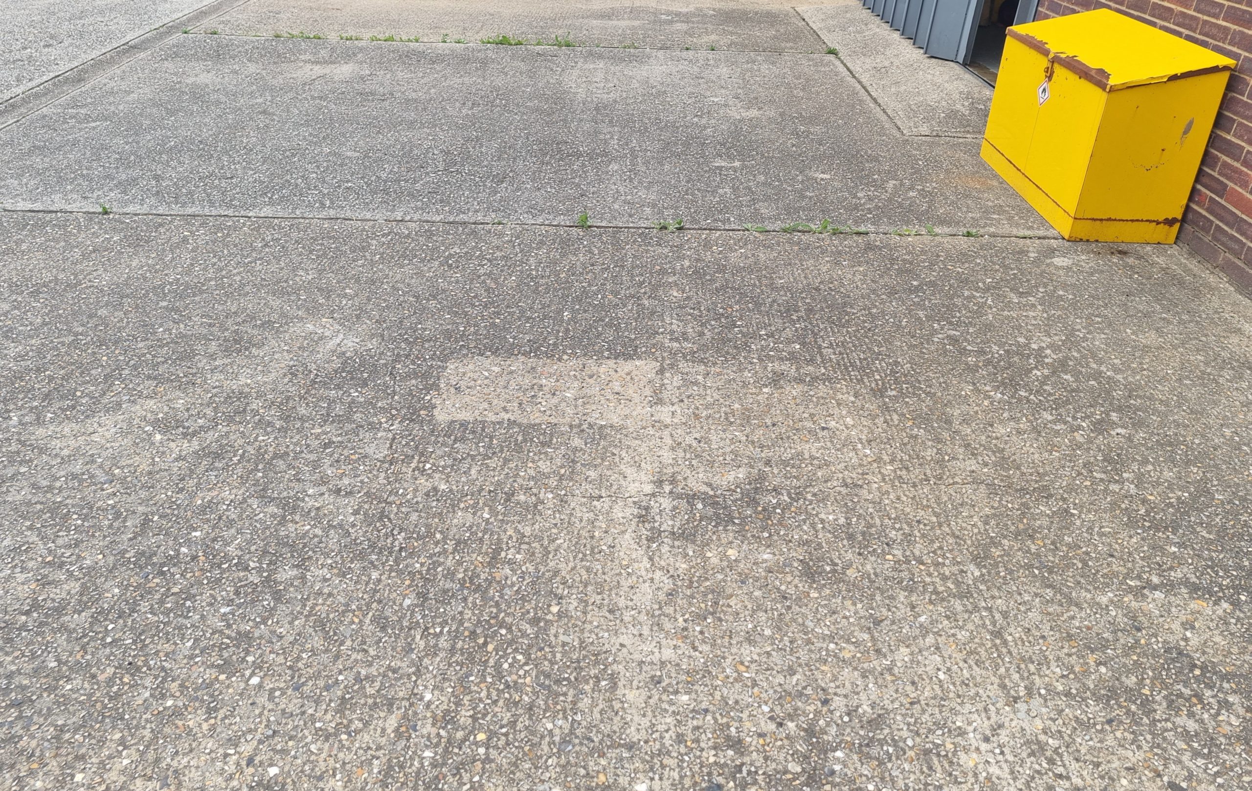 Before driveway cleaning – RJS Waste Management's main parking forecourt