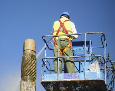 Worker high level industrial cleaning