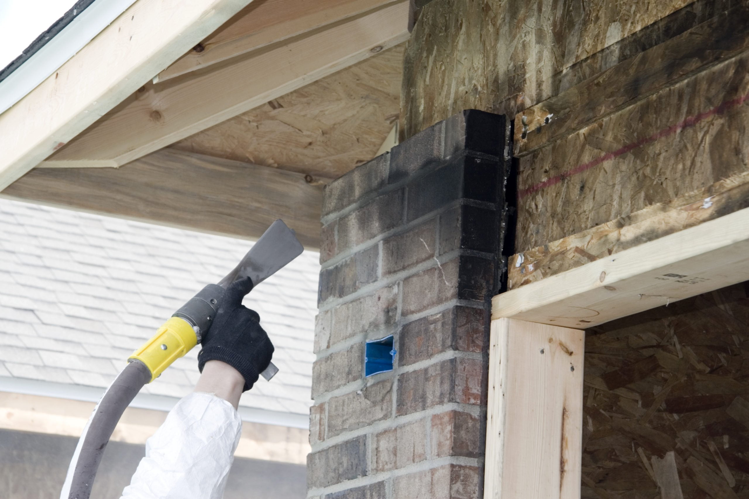 Soot removal from around an external doorway