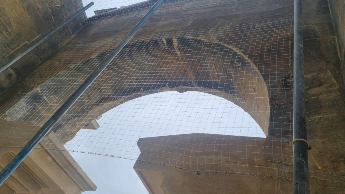 Bird proofing netting and fixtures on arches and roof spaces at a Blenheim heritage building