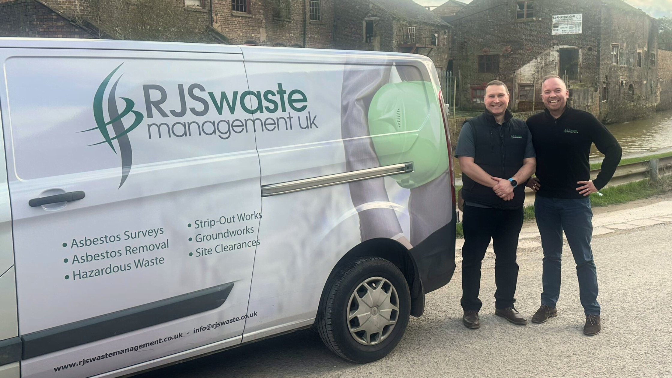 Dan Edge and Tony Wells standing next to an RJS Waste Management Midlands van
