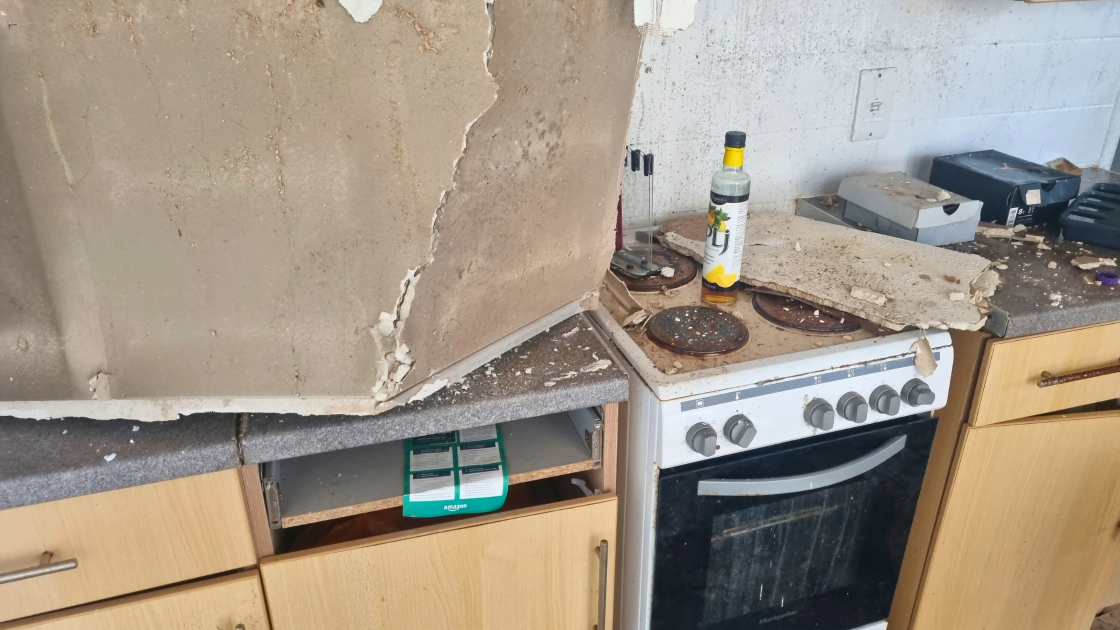 Fire damage to a Banbury kitchen and evidence of squatters.
